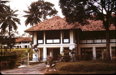 Singapore Naval Base Housing - 29 Admiralty Road 1965
A typical three bedroomed semidetached bungalow built around 1929. Allocated to civilian chargeman and similar grades along with their families on a posting to Singapore. At times. i.e. during the early days of the build of the base and post Japanese occupation when families were not present. These properties were allocated to three or four single men who were usually on an unaccompanied two year posting. During Japanese occupation some of these bungalows were used as workshops.   
