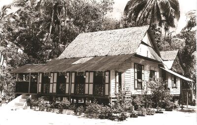 Sembawang Village - Kampung House 1958
One of the houses that was built in a Kampung close to Sembawang Village. Many of the inhabitants of these settlements worked in the Royal Naval Dockyard.  
