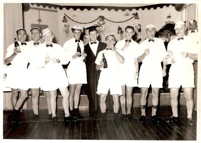 Singapore Naval Base - Dockyard Club New Years Eve (Gents) 1958 
Dockyard Club New Years Eve Fancy Dress Ball. Some of the men dress as School Boys. They won first prize. Photo by T K Lee Sembawang Photo Services.
Keywords: T K Lee; Sembawang Photo Services; Fancy Dress; School Boys