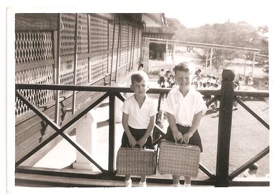 Royal Naval Base School 1959
RN School. Colin Banks (Rt) and friend arriving school with obligatory wicker basket to carry the days 'survival kit'. water, snacks etc.
